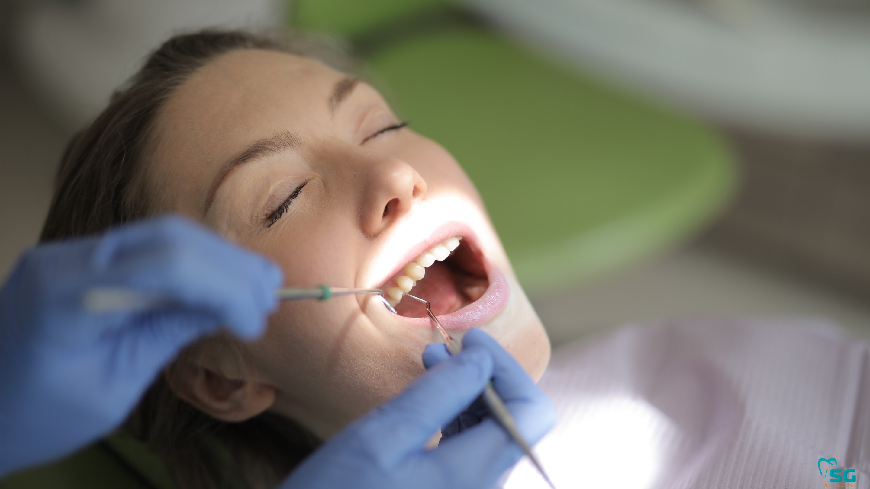 A patient receiving a dental examination
